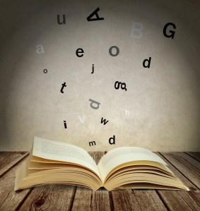 letters flying out of the book