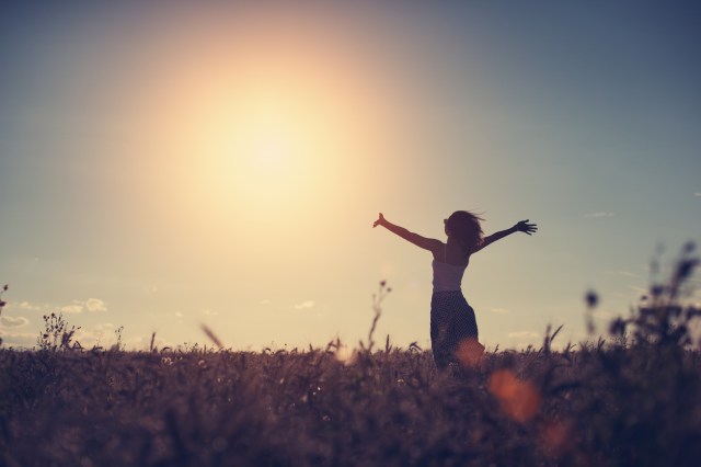 Silhouette of a girl in the field